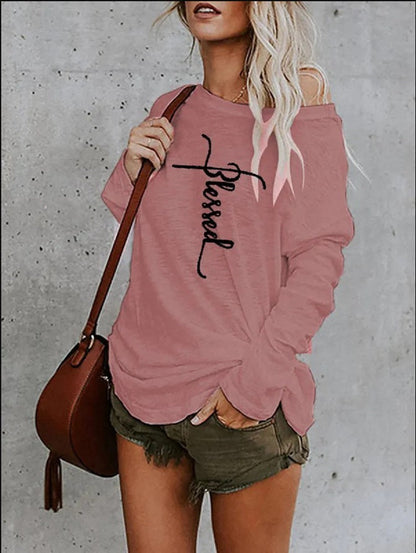 Pull Rachel™ assorti à un jean pour un look décontracté chic.