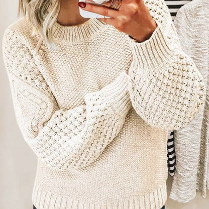 Pull Rose™ en maille douce, parfait pour un look chic et confortable.
