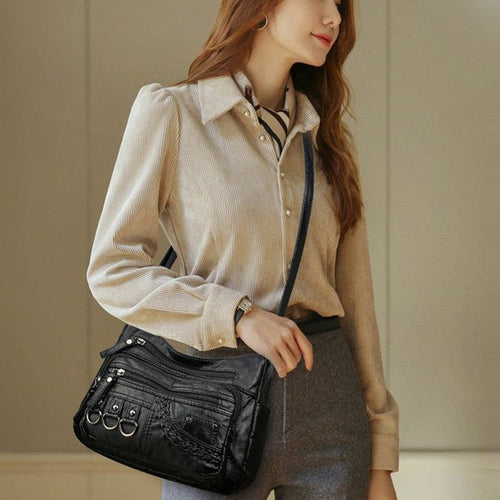 Sac Charmance™ polyvalent pour occasions décontractées et professionnelles.