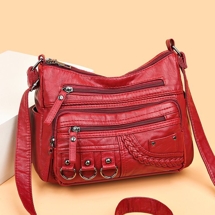 Sac bandoulière femme Charmance™ avec design élégant et pratique.